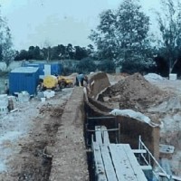 The 200" long wall begins title=